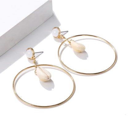Boucles d'oreille d'inspiration ethnique: Les Créoles Cauri