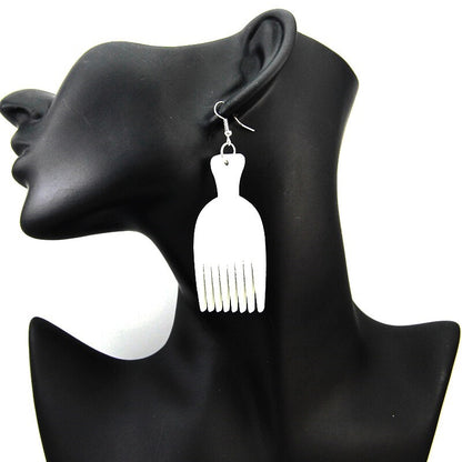 Boucles d'oreille d'inspiration ethnique: Peigne